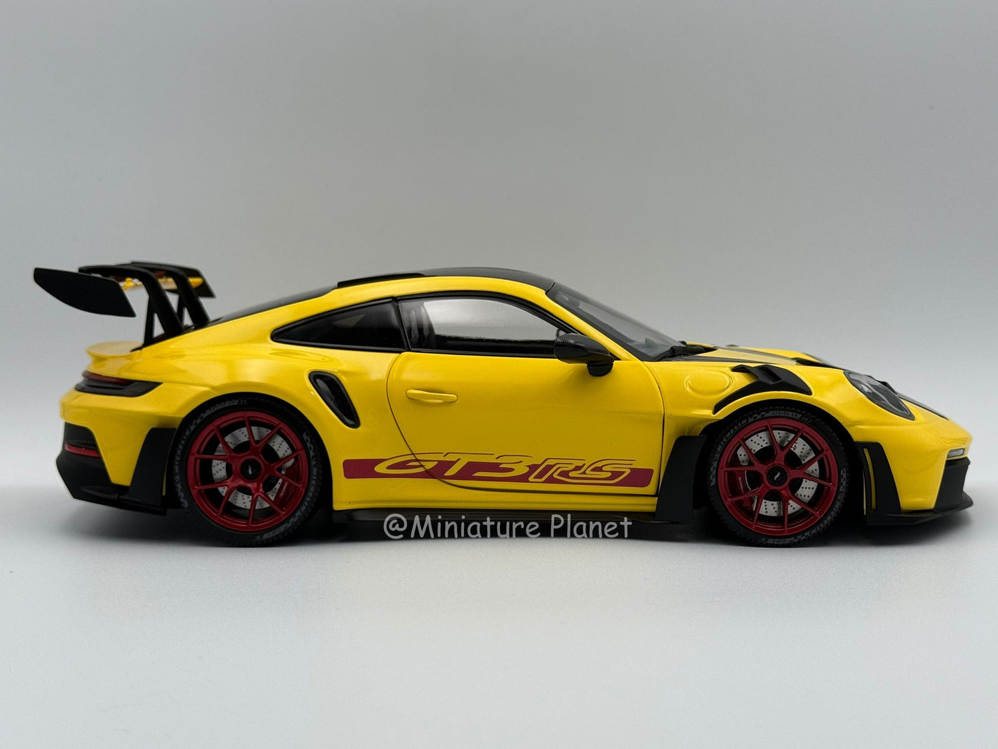 Minichamps 1:18 Porsche 911 (992) GT3 RS Weissach Package - Yellow with Red Accents