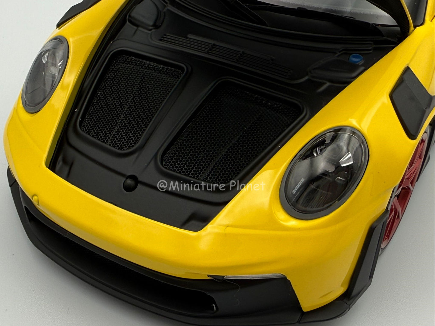 Minichamps 1:18 Porsche 911 (992) GT3 RS Weissach Package - Yellow with Red Accents