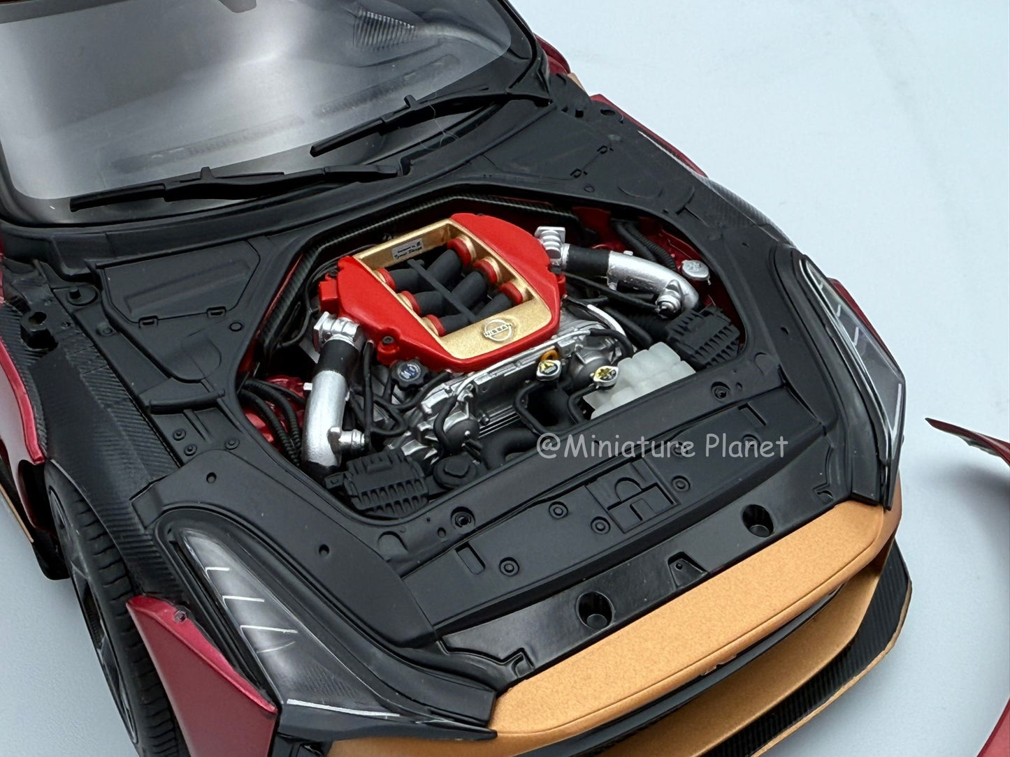 AUTOart 1:18 Nissan GT-R50 Italdesign (Metallic Red/Gold)