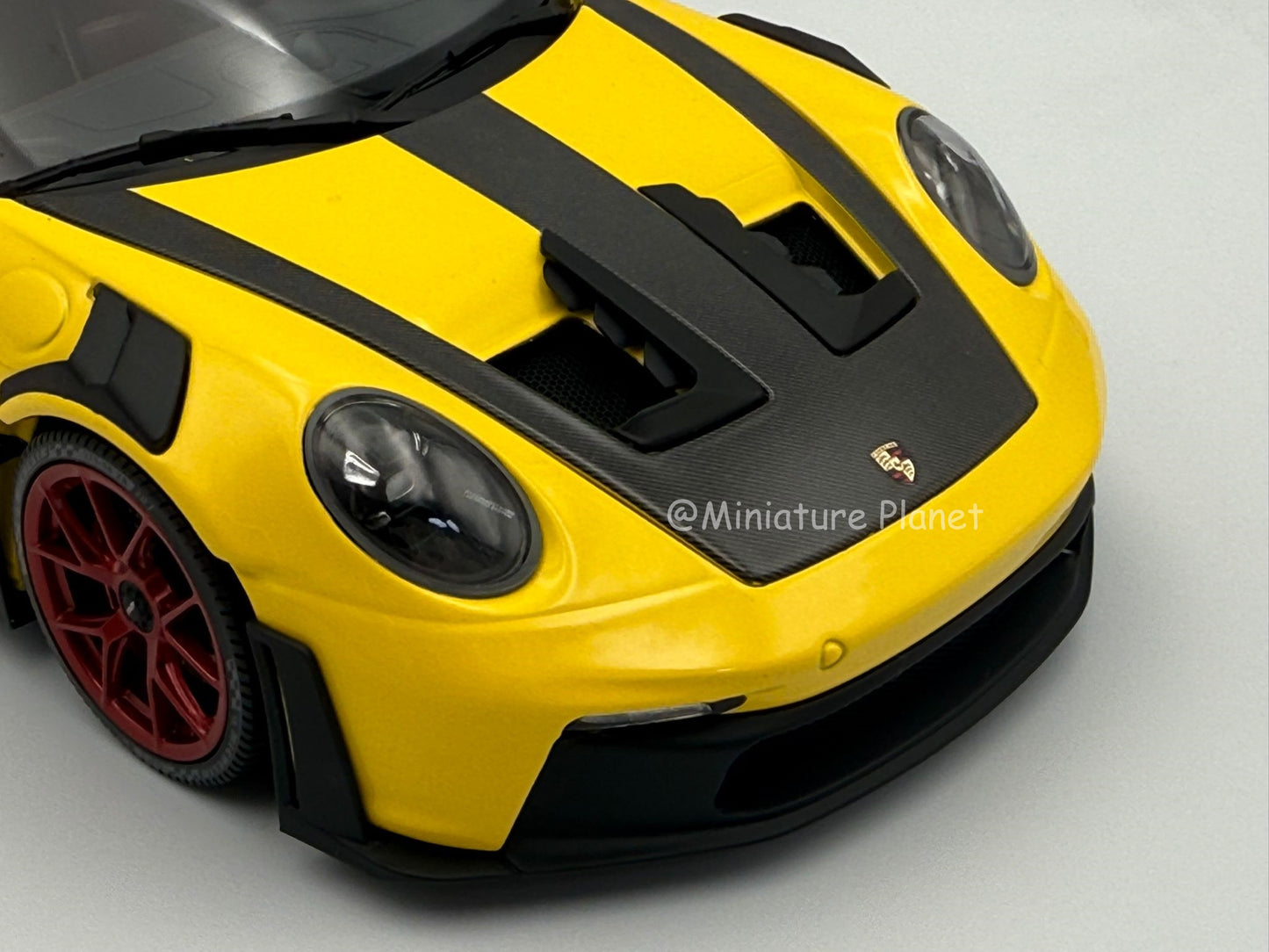 Minichamps 1:18 Porsche 911 (992) GT3 RS Weissach Package - Yellow with Red Accents