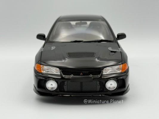 Motorhelix 1:18 Mitsubishi Evolution IV (Black Pearl)